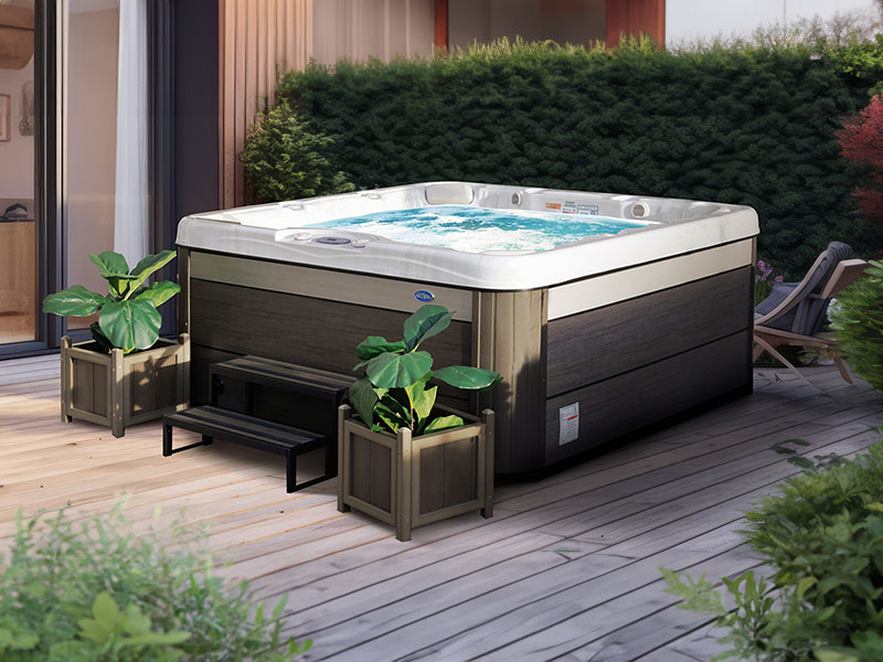 Hot Tubs, Spas, Portable Spas, Swim Spas for Sale Hot Tubs, Spas, Portable Spas, Swim Spas for Sale Calspas hot tub being used in a family setting