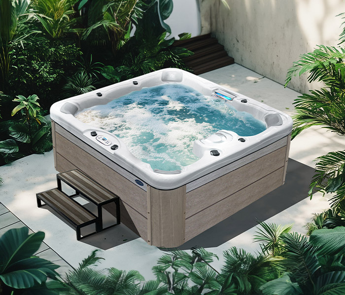 Hot Tubs, Spas, Portable Spas, Swim Spas for Sale Hot Tubs, Spas, Portable Spas, Swim Spas for Sale Calspas hot tub being used in a family setting