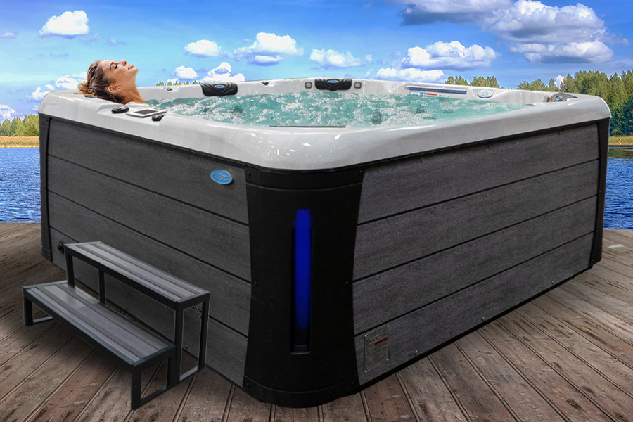 Hot Tubs, Spas, Portable Spas, Swim Spas for Sale Hot Tubs, Spas, Portable Spas, Swim Spas for Sale Calspas hot tub being used in a family setting