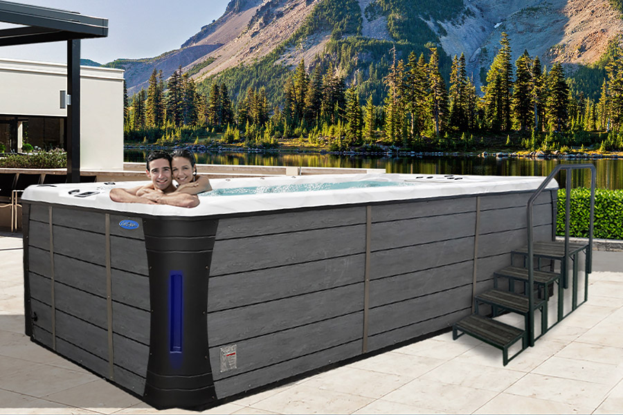 Hot Tubs, Spas, Portable Spas, Swim Spas for Sale Hot Tubs, Spas, Portable Spas, Swim Spas for Sale Calspas hot tub being used in a family setting