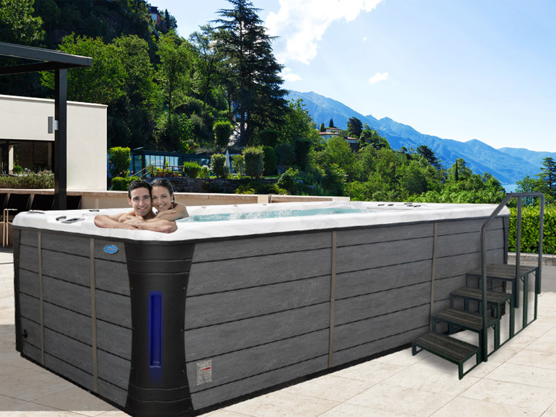 Hot Tubs, Spas, Portable Spas, Swim Spas for Sale Hot Tubs, Spas, Portable Spas, Swim Spas for Sale Calspas hot tub being used in a family setting