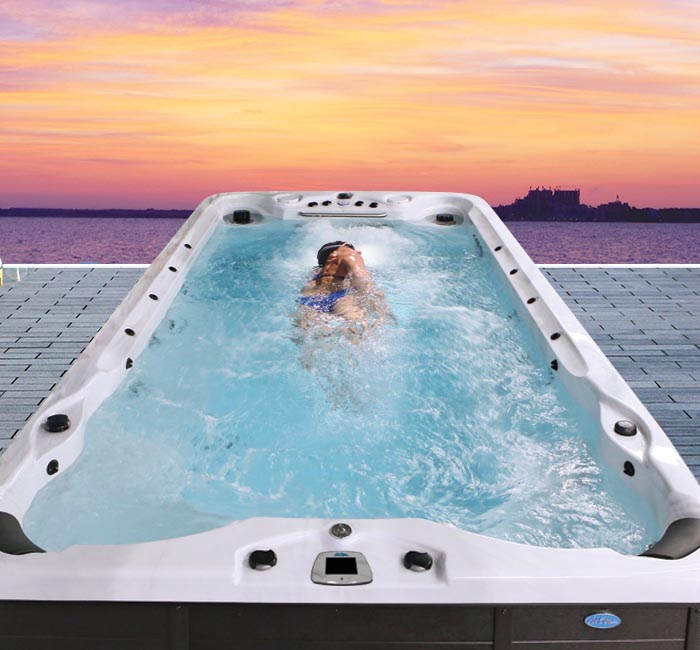 Hot Tubs, Spas, Portable Spas, Swim Spas for Sale Hot Tubs, Spas, Portable Spas, Swim Spas for Sale Calspas hot tub being used in a family setting